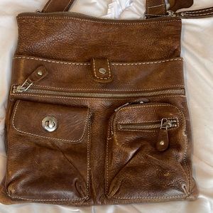Brown leather ROOTS bag